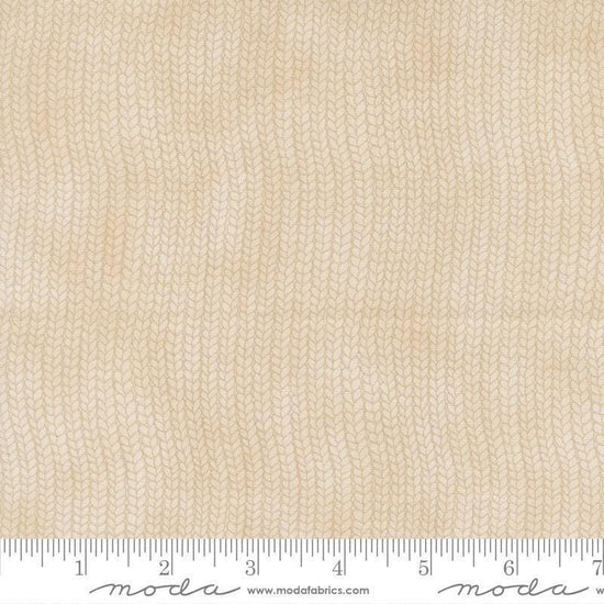 Image of When Snow Falls Stocking Weave Snowy White quilting cotton fabric by Deb Strain for Moda Fabrics. Features printed tonal knitting texture on a cream background. Cute Little Fabric Shop.