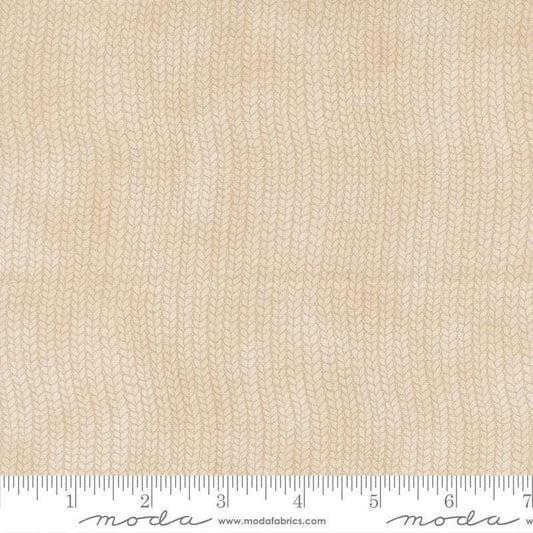 Image of When Snow Falls Stocking Weave Snowy White quilting cotton fabric by Deb Strain for Moda Fabrics. Features printed tonal knitting texture on a cream background. Cute Little Fabric Shop.