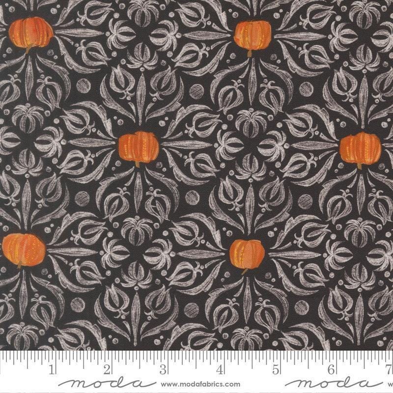 Image of Coven Medallion Tiles Onyx quilting cotton fabric by Robin Pickens for Moda Fabrics. Features pumpkins and swirls on a black background. Cute Little Fabric Shop.