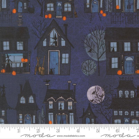 Image of Coven Witch Village Midnight quilting cotton fabric by Robin Pickens for Moda Fabrics. Features haunted houses on a blue background. Cute Little Fabric Shop.