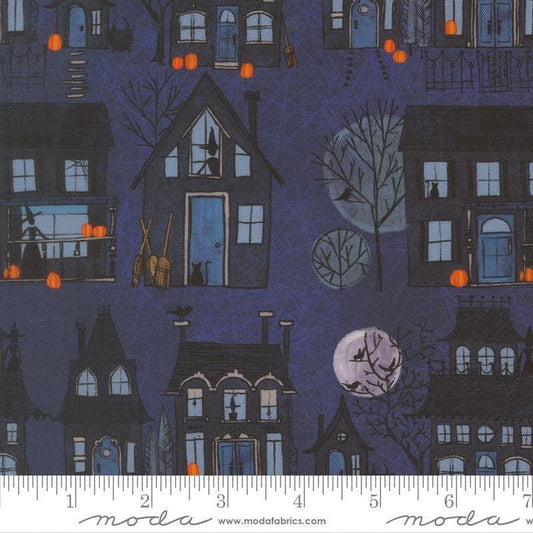 Image of Coven Witch Village Midnight quilting cotton fabric by Robin Pickens for Moda Fabrics. Features haunted houses on a blue background. Cute Little Fabric Shop.