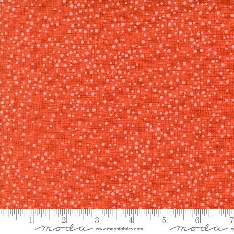 Image of Coven Dotty Thatched Tangerine quilting cotton fabric by Robin Pickens for Moda Fabrics. Features dots on an orange background. Cute Little Fabric Shop.