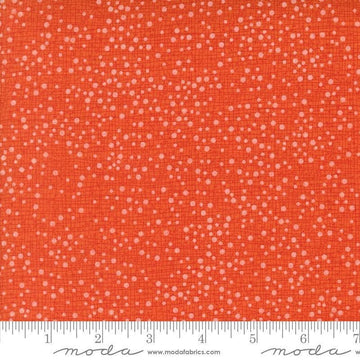Image of Coven Dotty Thatched Tangerine quilting cotton fabric by Robin Pickens for Moda Fabrics. Features dots on an orange background. Cute Little Fabric Shop.