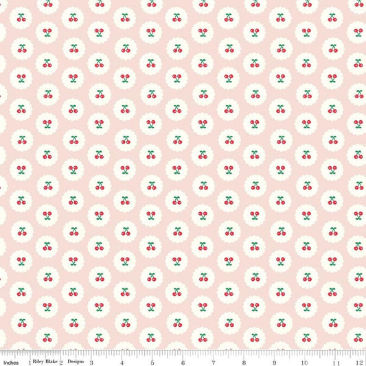 Image of Cotton Nook Cherries Blush quilting cotton fabric by Minki Kim for Riley Blake Designs. Features cherries on a pink background. Cute Little Fabric Shop.