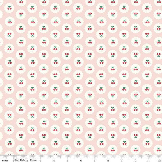 Image of Cotton Nook Cherries Blush quilting cotton fabric by Minki Kim for Riley Blake Designs. Features cherries on a pink background. Cute Little Fabric Shop.