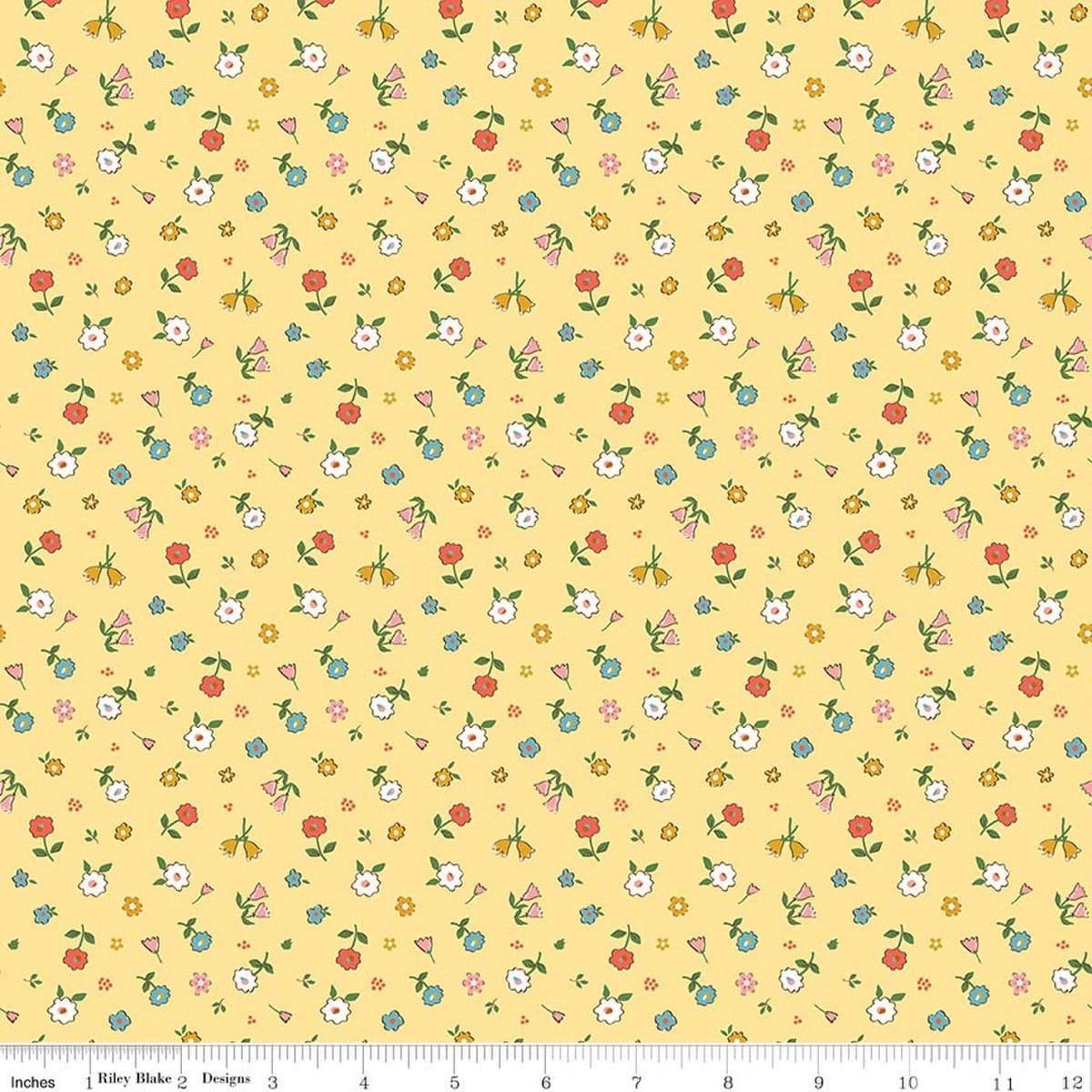 Image of Cotton Nook Pretty Sunshine quilting cotton fabric by Minki Kim for Riley Blake Designs. Features flowers on a yellow background. Cute Little Fabric Shop.