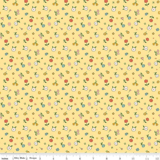 Image of Cotton Nook Pretty Sunshine quilting cotton fabric by Minki Kim for Riley Blake Designs. Features flowers on a yellow background. Cute Little Fabric Shop.