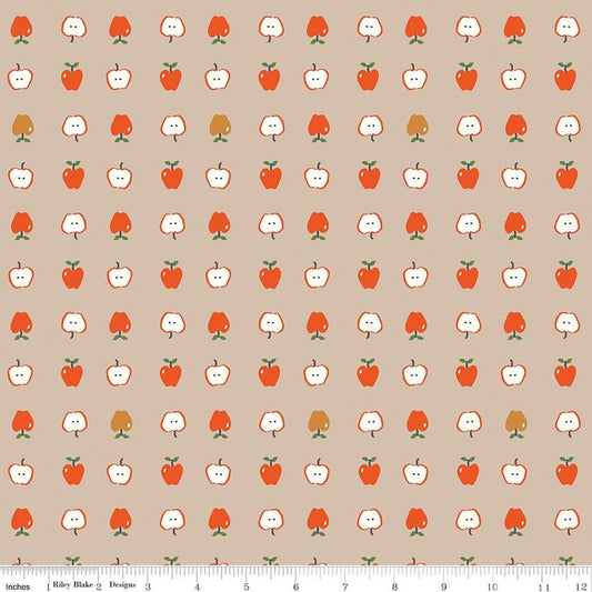 Image of Cotton Nook Apples Biscuit quilting cotton fabric by Minki Kim for Riley Blake Designs. Features apples on a brown background. Cute Little Fabric Shop.
