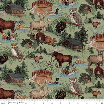 Image of Whispering Pines Main Green quilting cotton fabric by The RBD Designers for Riley Blake Designs. Features animals on a green background. Cute Little Fabric Shop.