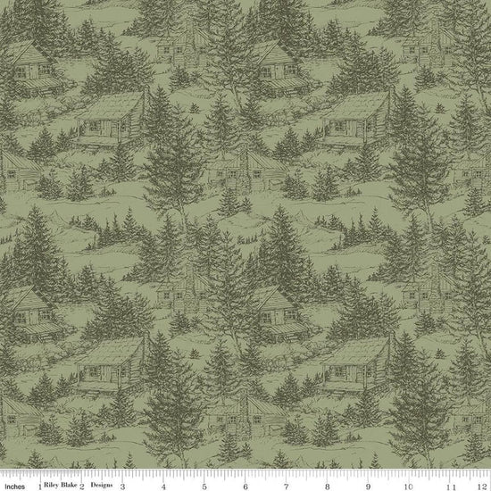 Image of Whispering Pines Cabins Green quilting cotton fabric by The RBD Designers for Riley Blake Designs. Features cabins in trees on a green background. Cute Little Fabric Shop.