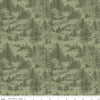 Image of Whispering Pines Cabins Green quilting cotton fabric by The RBD Designers for Riley Blake Designs. Features cabins in trees on a green background. Cute Little Fabric Shop.