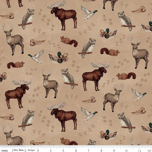 Image of Whispering Pines Animal Toss Tan quilting cotton fabric by The RBD Designers for Riley Blake Designs. Features animals on a brown background. Cute Little Fabric Shop.