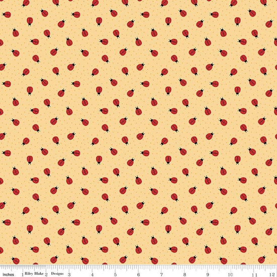 Image of Little Ladybug Ladybugs Yellow quilting cotton fabric by Lori Whitlock for Riley Black Designs. Features ladybugs on a yellow background. Cute Little Fabric Shop.