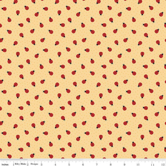 Image of Little Ladybug Ladybugs Yellow quilting cotton fabric by Lori Whitlock for Riley Black Designs. Features ladybugs on a yellow background. Cute Little Fabric Shop.