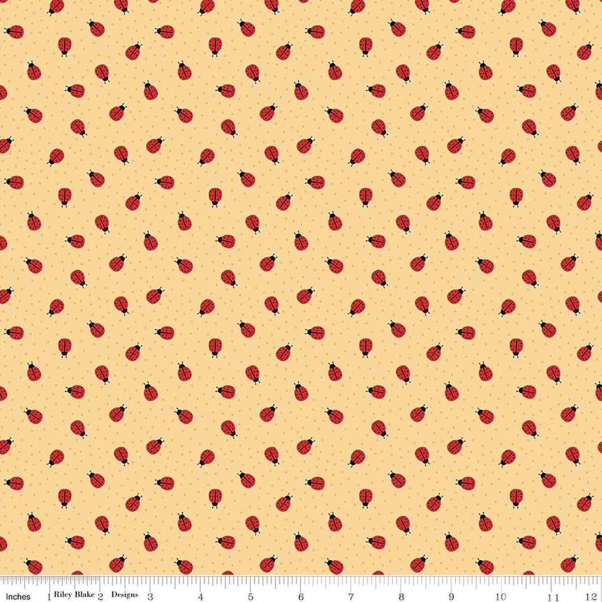 Image of Little Ladybug Ladybugs Yellow quilting cotton fabric by Lori Whitlock for Riley Black Designs. Features ladybugs on a yellow background. Cute Little Fabric Shop.