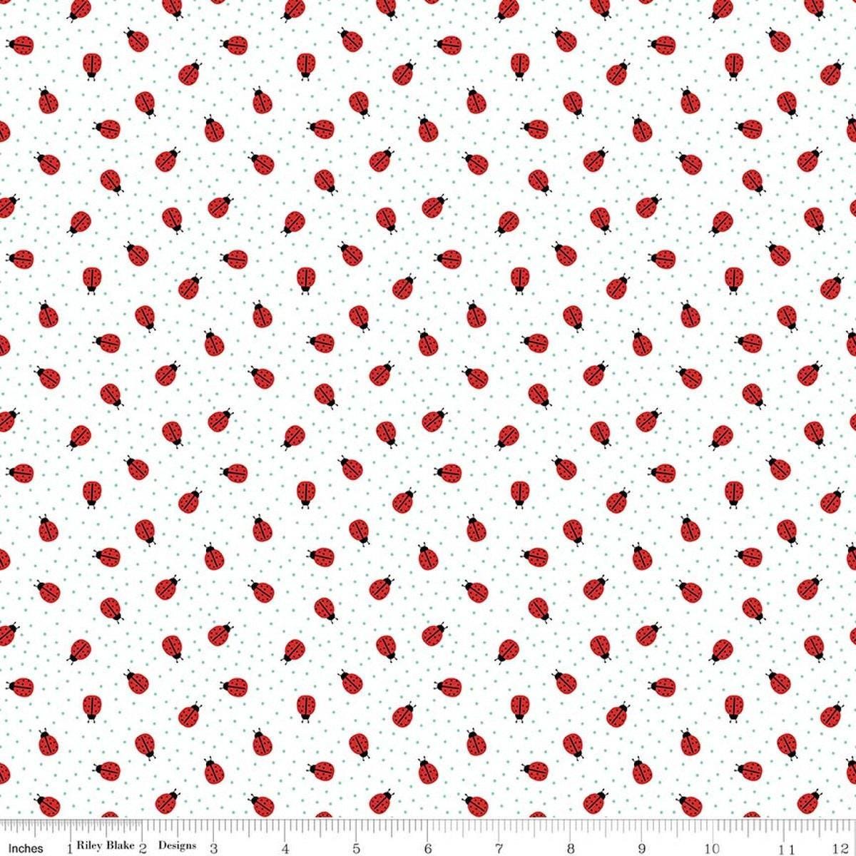 Image of Little Ladybug Ladybugs White quilting cotton fabric by Lori Whitlock for Riley Black Designs. Features ladybugs on a White background. Cute Little Fabric Shop.