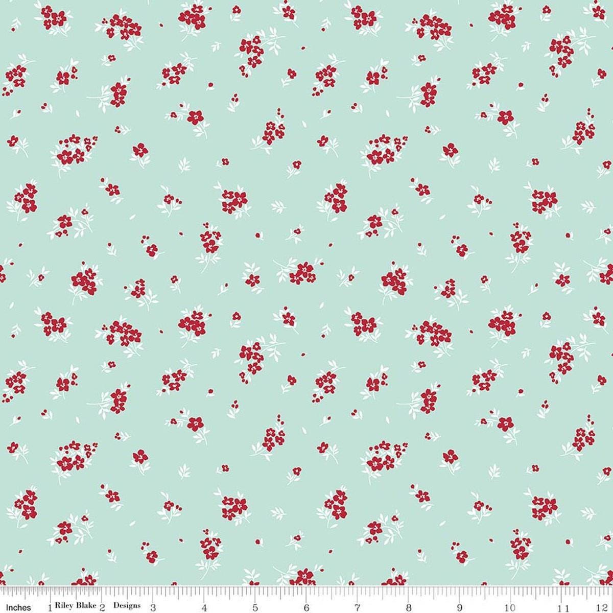 Image of Little Ladybug Mini Flowers Blue quilting cotton fabric by Lori Whitlock for Riley Black Designs. Features flowers on a blue background. Cute Little Fabric Shop.