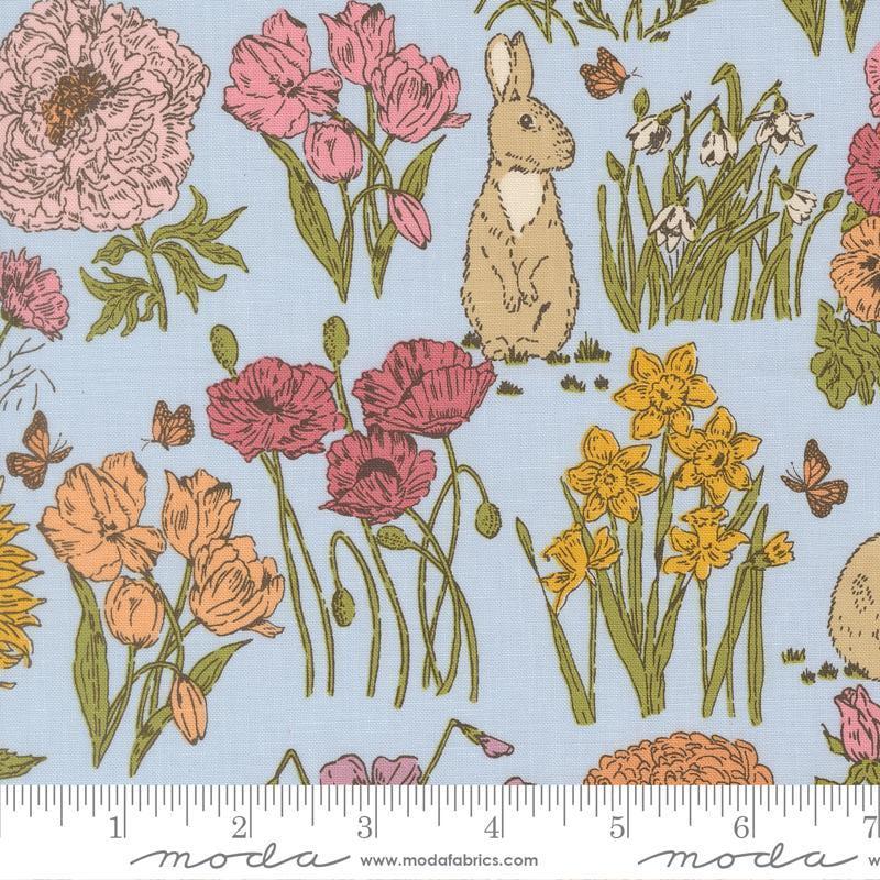 Image of My Secret Garden Bunnies Sky quilting cotton fabric by Stacy Iest Hsu for Moda Fabrics. Features flowers on a blue background. Cute Little Fabric Shop.