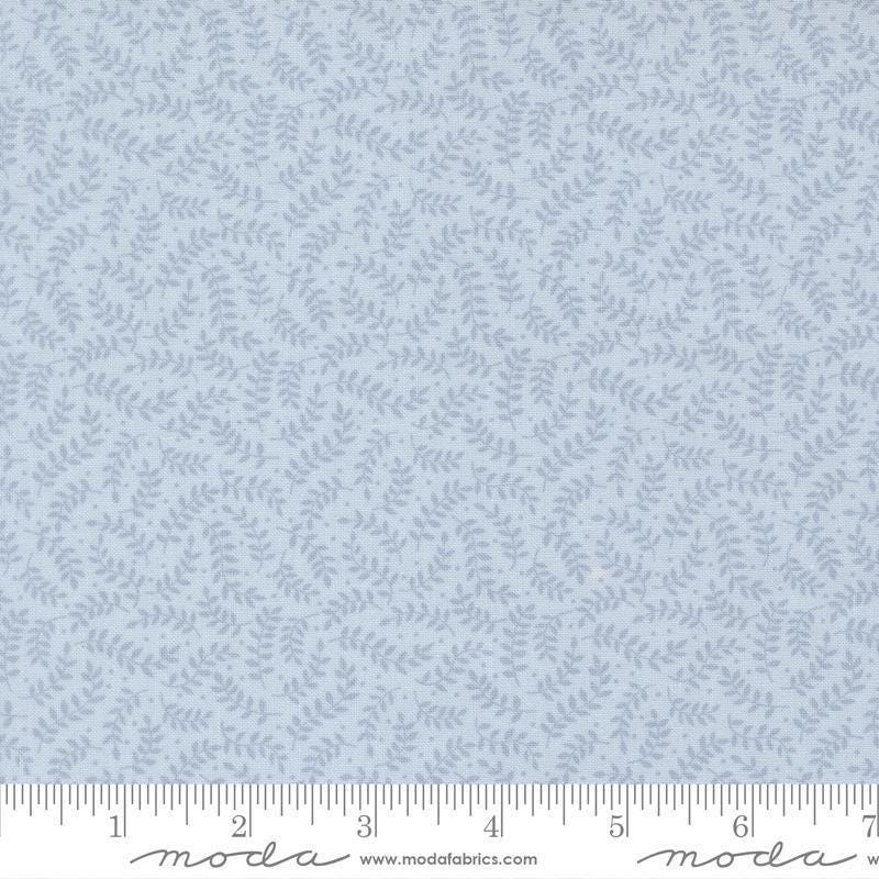 Image of My Secret Garden Crawling Vines Sky quilting cotton fabric by Stacy Iest Hsu for Moda Fabrics. Features leaves on a blue background. Cute Little Fabric Shop.