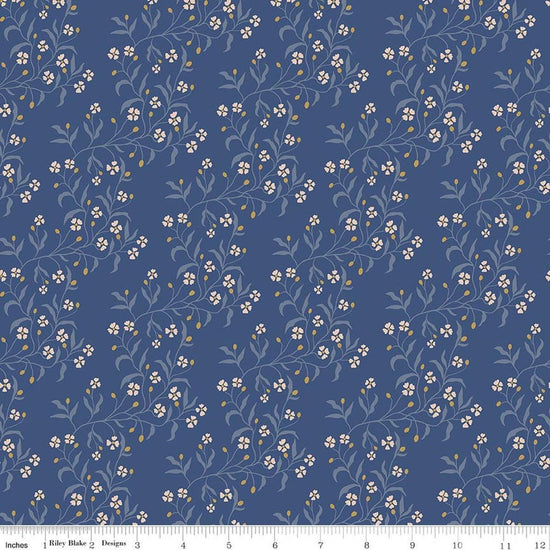 Image of Before the Blooms Astrid Denim quilting cotton fabric by Danelys Sidron for Riley Blake Designs. Features flowers on a blue background. Cute Little Fabric Shop.