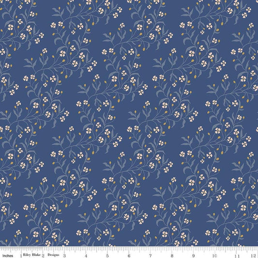 Image of Before the Blooms Astrid Denim quilting cotton fabric by Danelys Sidron for Riley Blake Designs. Features flowers on a blue background. Cute Little Fabric Shop.