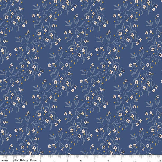 Image of Before the Blooms Astrid Denim quilting cotton fabric by Danelys Sidron for Riley Blake Designs. Features flowers on a blue background. Cute Little Fabric Shop.