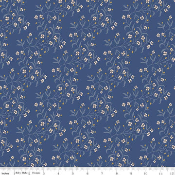 Image of Before the Blooms Astrid Denim quilting cotton fabric by Danelys Sidron for Riley Blake Designs. Features flowers on a blue background. Cute Little Fabric Shop.