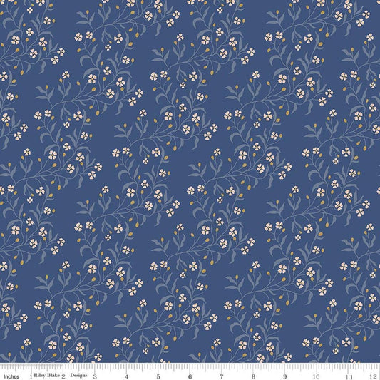 Image of Before the Blooms Astrid Denim quilting cotton fabric by Danelys Sidron for Riley Blake Designs. Features flowers on a blue background. Cute Little Fabric Shop.