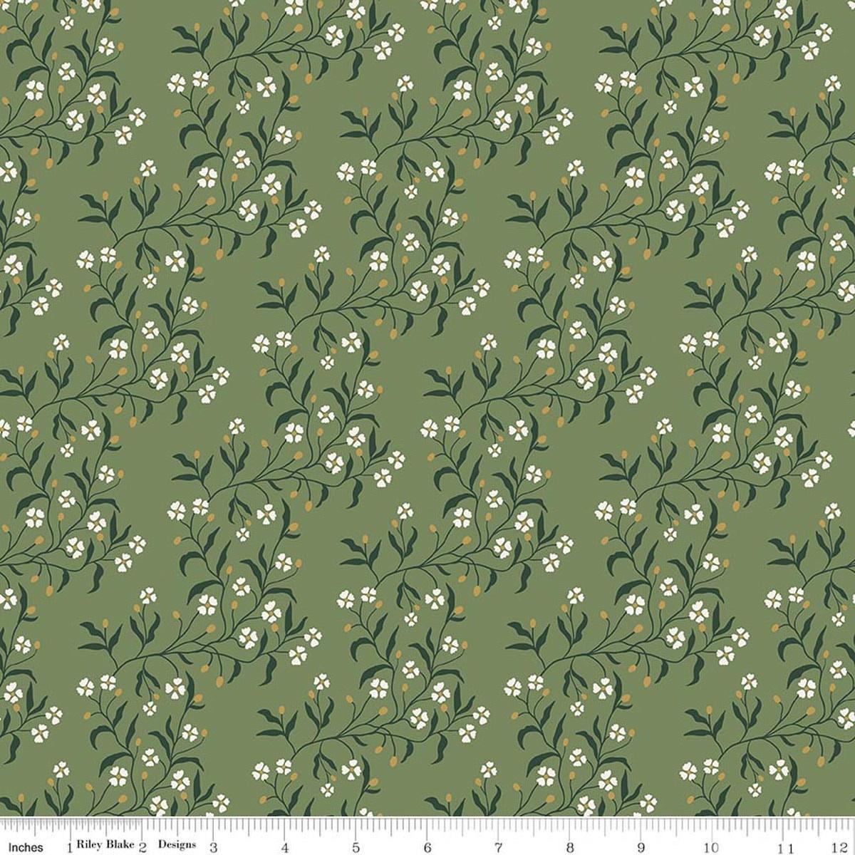 Image of Before the Blooms Astrid Basil quilting cotton fabric by Danelys Sidron for Riley Blake Designs. Features flowers on a green background. Cute Little Fabric Shop.
