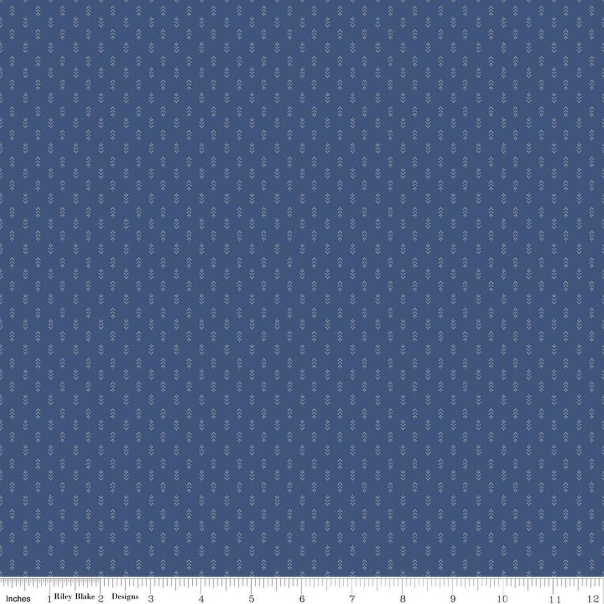 Image of Before the Blooms Mira Denim quilting cotton fabric by Danelys Sidron for Riley Blake Designs. Features flowers on a blue background. Cute Little Fabric Shop.