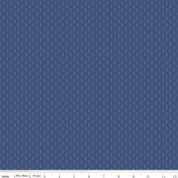Image of Before the Blooms Mira Denim quilting cotton fabric by Danelys Sidron for Riley Blake Designs. Features flowers on a blue background. Cute Little Fabric Shop.