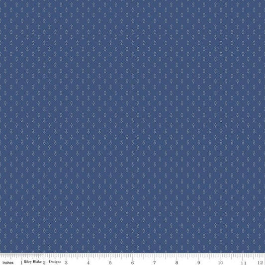 Image of Before the Blooms Mira Denim quilting cotton fabric by Danelys Sidron for Riley Blake Designs. Features flowers on a blue background. Cute Little Fabric Shop.