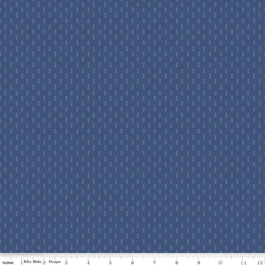 Image of Before the Blooms Mira Denim quilting cotton fabric by Danelys Sidron for Riley Blake Designs. Features flowers on a blue background. Cute Little Fabric Shop.