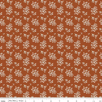Image of Before the Blooms Juniper Rust quilting cotton fabric by Danelys Sidron for Riley Blake Designs. Features flowers on an orange background. Cute Little Fabric Shop.