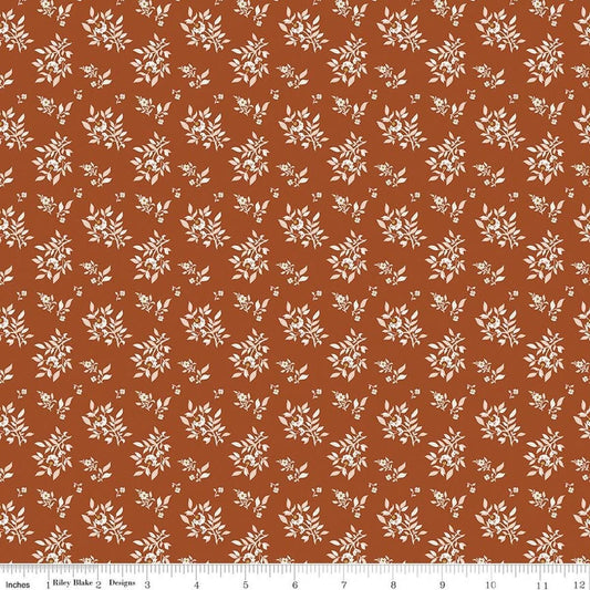 Image of Before the Blooms Juniper Rust quilting cotton fabric by Danelys Sidron for Riley Blake Designs. Features flowers on an orange background. Cute Little Fabric Shop.