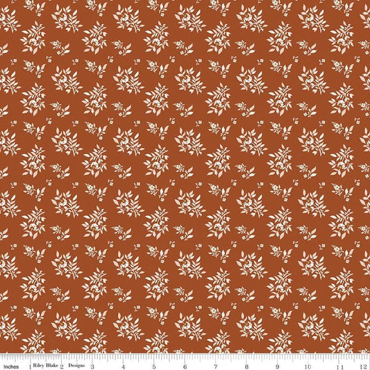 Image of Before the Blooms Juniper Rust quilting cotton fabric by Danelys Sidron for Riley Blake Designs. Features flowers on an orange background. Cute Little Fabric Shop.