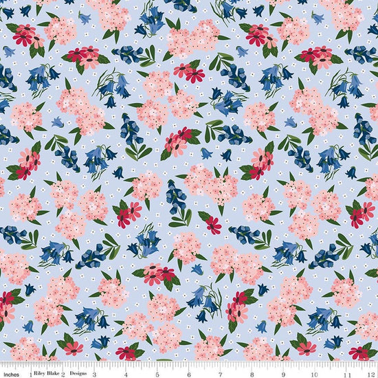 Image of Foxglove Main Blue quilting cotton fabric by Jill Finley for Riley Blake Designs. Features flowers on a blue background. Cute Little Fabric Shop.