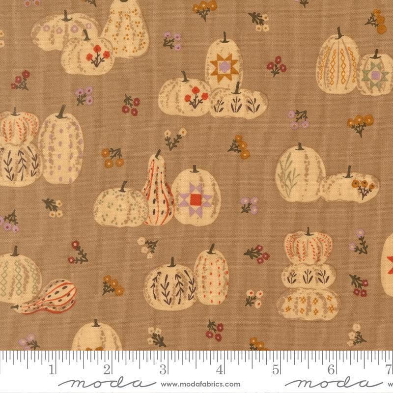 Image of Windfall Pumpkin Patches Oatmeal quilting cotton fabric by Fancy That Design House for Moda Fabric. Features pumpkins on a brown background. Cute Little Fabric Shop.
