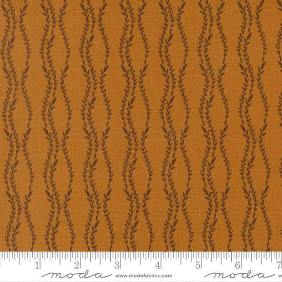 Image of Windfall Vine Stripe Caramel quilting cotton fabric by Fancy That Design House for Moda Fabric. Features vines on a brown background. Cute Little Fabric Shop.