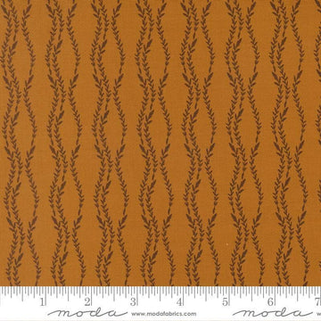 Image of Windfall Vine Stripe Caramel quilting cotton fabric by Fancy That Design House for Moda Fabric. Features vines on a brown background. Cute Little Fabric Shop.