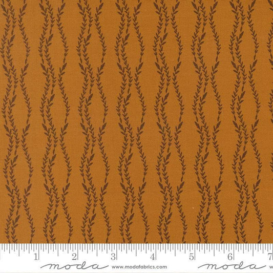 Image of Windfall Vine Stripe Caramel quilting cotton fabric by Fancy That Design House for Moda Fabric. Features vines on a brown background. Cute Little Fabric Shop.