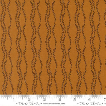 Image of Windfall Vine Stripe Caramel quilting cotton fabric by Fancy That Design House for Moda Fabric. Features vines on a brown background. Cute Little Fabric Shop.