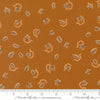 Image of Windfall Autumn Breeze Caramel quilting cotton fabric by Fancy That Design House for Moda Fabric. Features leaves on a brown background. Cute Little Fabric Shop.