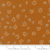 Image of Windfall Autumn Breeze Caramel quilting cotton fabric by Fancy That Design House for Moda Fabric. Features leaves on a brown background. Cute Little Fabric Shop.