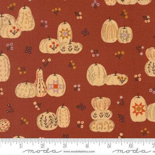Image of Windfall Pumpkin Patches Rust quilting cotton fabric by Fancy That Design House for Moda Fabric. Features pumpkins on a red background. Cute Little Fabric Shop.