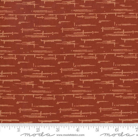 Image of Windfall Textured Blender Rust quilting cotton fabric by Fancy That Design House for Moda Fabric. Features printed texture on a red background. Cute Little Fabric Shop.