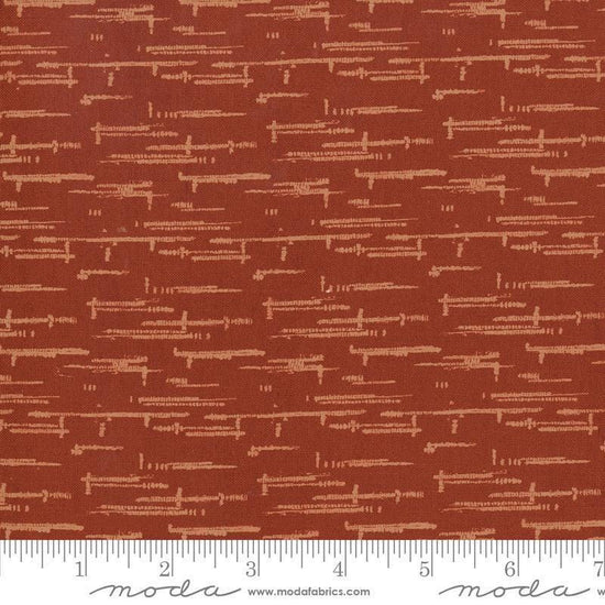 Image of Windfall Textured Blender Rust quilting cotton fabric by Fancy That Design House for Moda Fabric. Features printed texture on a red background. Cute Little Fabric Shop.