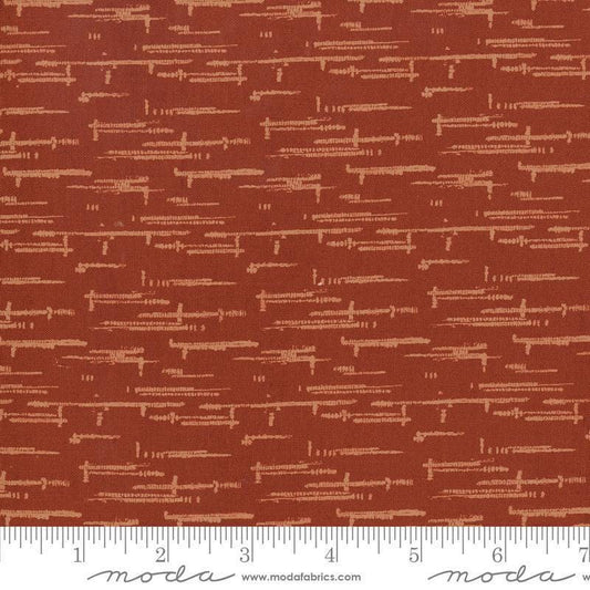 Image of Windfall Textured Blender Rust quilting cotton fabric by Fancy That Design House for Moda Fabric. Features printed texture on a red background. Cute Little Fabric Shop.