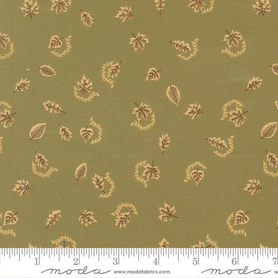 Image of Windfall Autumn Breeze Meadow quilting cotton fabric by Fancy That Design House for Moda Fabric. Features leaves on a green background. Cute Little Fabric Shop.