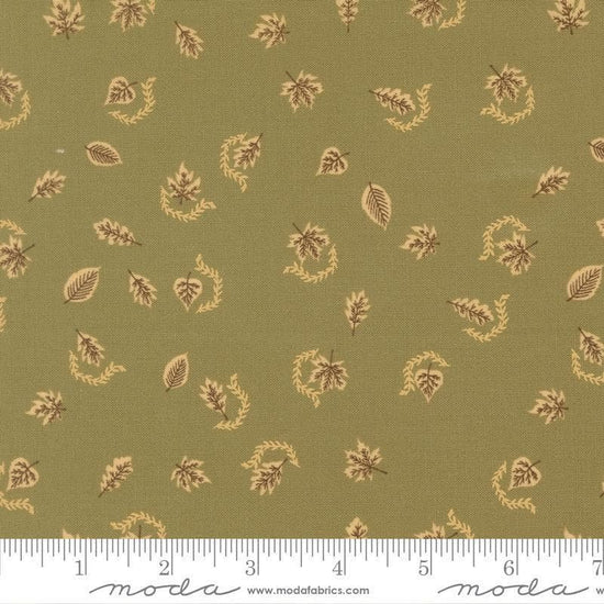 Image of Windfall Autumn Breeze Meadow quilting cotton fabric by Fancy That Design House for Moda Fabric. Features leaves on a green background. Cute Little Fabric Shop.